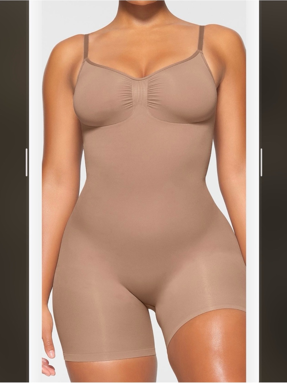 SKIMS Sculpting Seamless Mid Thigh Bodysuit in Sienna